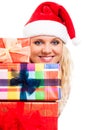 Attractive woman in Santa hat with Christmas gifts Royalty Free Stock Photo