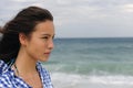 Attractive woman at the sea facing the future