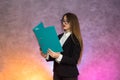 Attractive woman secretary holding folder. Business concept Royalty Free Stock Photo