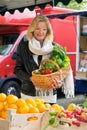 Attractive woman shopping for fresh produce Royalty Free Stock Photo