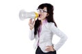 Attractive woman shouting with megaphone Royalty Free Stock Photo