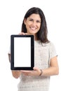 Attractive woman showing a big blank tablet screen Royalty Free Stock Photo