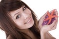 Attractive woman and starfish. Spa. Royalty Free Stock Photo