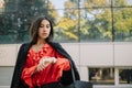 Attractive woman in suit looking at her watch Royalty Free Stock Photo