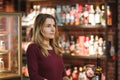 Attractive woman taste red wine in the restaurant Royalty Free Stock Photo