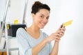 Attractive woman tinkering in home workshop Royalty Free Stock Photo