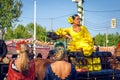 Attractive woman in traditional dress travelling in a horse drawn carriages at the April Fair, Seville Fair Feria de Sevilla. Royalty Free Stock Photo