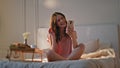 Attractive woman videocalling home in morning. Happy girl talking partner online Royalty Free Stock Photo