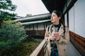 An attractive woman walking through the garden Royalty Free Stock Photo