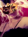 Attractive woman wearing carnival mask. Royalty Free Stock Photo