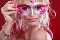 Attractive woman wearing carnival mask. Royalty Free Stock Photo