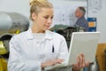 Attractive woman wearing labcoat