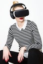 Attractive woman wearing virtual reality goggles. VR headset. Royalty Free Stock Photo