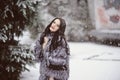 Attractive woman in white and gray fur coat Royalty Free Stock Photo