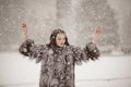 Attractive woman in white and gray fur coat Royalty Free Stock Photo