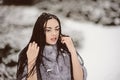 Attractive woman in white and gray fur coat Royalty Free Stock Photo