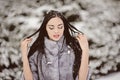 Attractive woman in white and gray fur coat Royalty Free Stock Photo