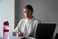 Attractive woman working on laptop at home Royalty Free Stock Photo