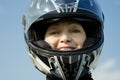 Attractive woman 60 years old in a motorcycle helmet