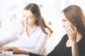 Attractive women talking on phone Royalty Free Stock Photo