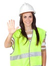 Attractive worker with reflector vest saying Stop