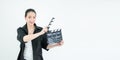 An attractive young asian woman holds an open film slate on white background