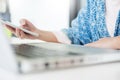 Attractive Young beautiful entrepreneur Woman smiling and looking at laptop screen, Working from Home Royalty Free Stock Photo