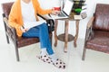 Attractive Young beautiful entrepreneur Woman smiling and looking at laptop screen, Working from Home Royalty Free Stock Photo