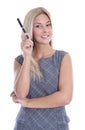 Attractive young blond business woman pointing with a pen. Royalty Free Stock Photo