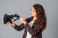 Attractive young brunette girl testing virtual reality glasses Royalty Free Stock Photo