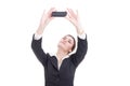 Attractive young business woman taking a selfie using smartphone Royalty Free Stock Photo