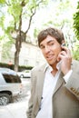 Businessman with ear set. Royalty Free Stock Photo