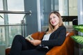 Attractive young businesswoman counting money dollars and smile. Royalty Free Stock Photo