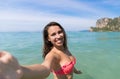 Attractive Young Caucasian Woman In Swimsuit On Beach Taking Selfie Photo, Girl Blue Sea Water Holiday Royalty Free Stock Photo