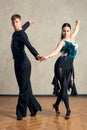 Attractive young couple of children dancing ballroom dance Royalty Free Stock Photo