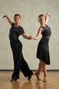 Attractive young couple of children dancing ballroom dance Royalty Free Stock Photo