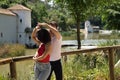 Attractive young couple dancing sensual bachata in an outdoor park with a river in the background. Latin, sensual, folkloric, Royalty Free Stock Photo