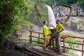 Attractive young couple kissing under jungle waterfall Royalty Free Stock Photo