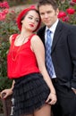 Attractive Young Couple By Roses Royalty Free Stock Photo