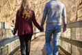 Attractive young couple walking away from viewer Royalty Free Stock Photo