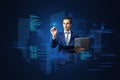 Attractive young european business man with laptop standing on abstract blue background with coding and tech information. Database Royalty Free Stock Photo