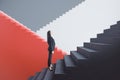 Attractive young european businesswoman standing on red and concrete staircase with mock up place. Success, finance and career