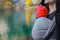 Attractive young father with her infant baby in sling outdoor. Babywearing concept Royalty Free Stock Photo