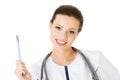 Attractive young female doctor with scalpel. Royalty Free Stock Photo