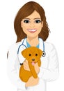 Attractive young female veterinarian hugging cute little dog Royalty Free Stock Photo