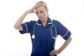 Attractive Young Frustrated Woman Posing As A Doctor or Nurse In Theatre Sc Royalty Free Stock Photo