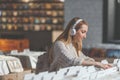 Young girl browsing records in a store Royalty Free Stock Photo