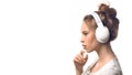 Attractive young girl with headphones over white background Royalty Free Stock Photo