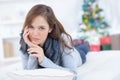 Attractive young girl laying on floor at home Royalty Free Stock Photo