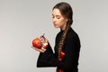 Attractive young girl with long braid and red bow Royalty Free Stock Photo